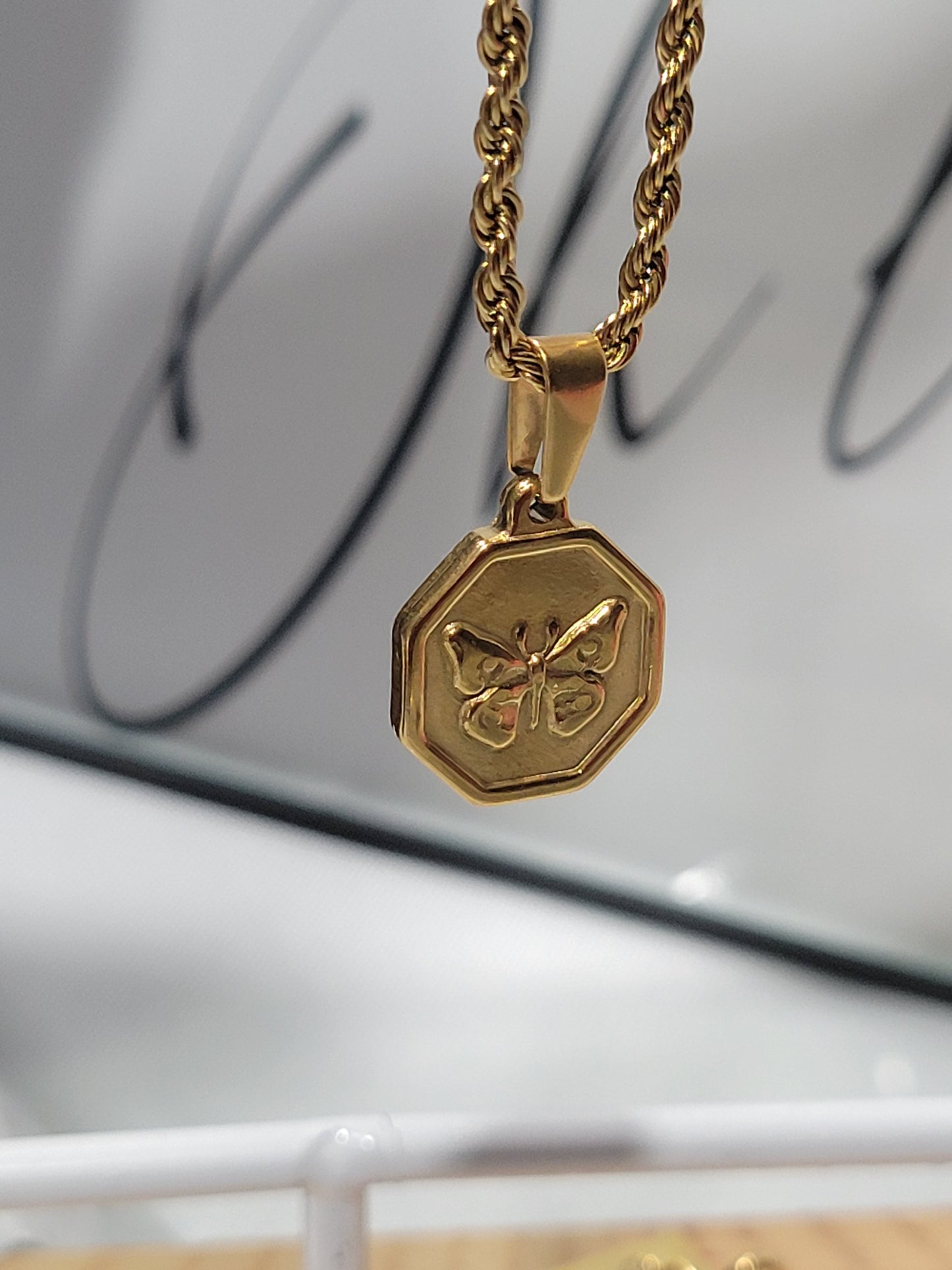 BUTTERFLY CHARM 11 NECKLACE